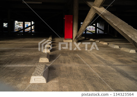 Parking lot and wheel chocks in the morning sun [Nagano Prefecture] 134323564