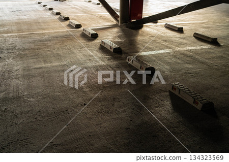 Parking lot and wheel chocks in the morning sun [Nagano Prefecture] 134323569