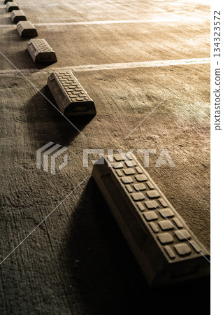 Parking lot and wheel chocks in the morning sun [Nagano Prefecture] 134323572