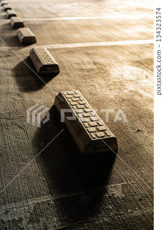 Parking lot and wheel chocks in the morning sun [Nagano Prefecture] 134323574