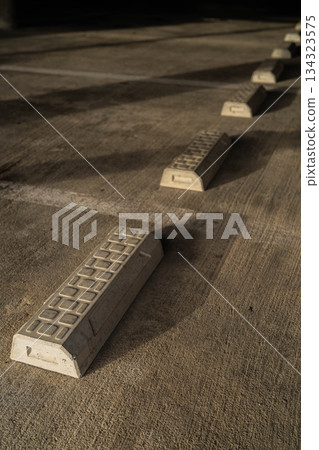 Parking lot and wheel chocks in the morning sun [Nagano Prefecture] 134323575