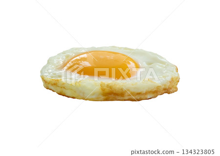 Fried egg isolated on white background top view Fried egg isolated on white background top view 134323805