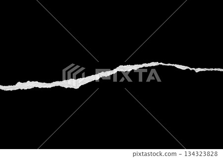Ripped torn paper edges isolated on black background 134323828