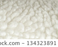 Wool plush fleece fur fabric texture background 134323891