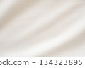 Abstract white fabric soft wave smooth texture surface background 134323895