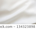 Abstract white fabric soft wave smooth texture surface background 134323898