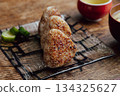 Grilled rice balls cooked over an open flame with a fragrant burnt finish Grilled rice balls cooked over an open flame with a fragrant burnt finish 134325627
