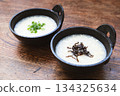 Egg porridge topped with green onions and salted kelp Egg porridge topped with green onions and salted kelp 134325634