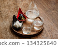 A simple chilled sake set of unpasteurized sake and pickles A simple chilled sake set of unpasteurized sake and pickles 134325640