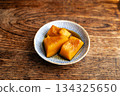 A classic side dish, sweet simmered pumpkin, served on a small plate A classic side dish, sweet simmered pumpkin, served on a small plate 134325650