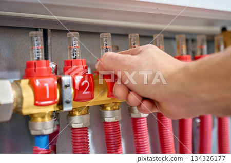 Hand adjusting heating manifold valve with flow meters Hand adjusting heating manifold valve with flow meters 134326177