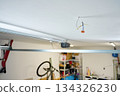 Ceiling electrical wiring prepared for lighting installation in garage 134326230