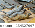 Charcoal grilled river fish 134327097