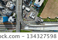 Aerial view of modern city and roads taken by drone 134327598