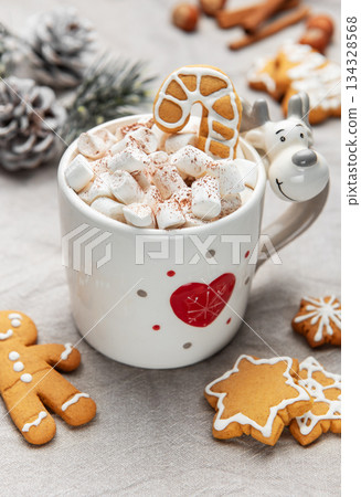 Hot chocolate with marshmallows and gingerbread cookies for christmas Hot chocolate with marshmallows and gingerbread cookies for christmas 134328568