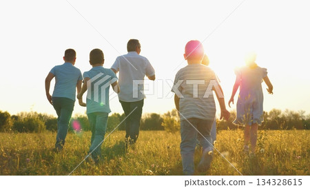Child kid superhero, childhood dream flying, mother father run nature sunset, family running park summer, children playing outdoors at dusk, family time under a warm sky, kids running with parents 134328615