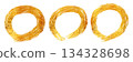A single stroke illustration of a gold-colored circle drawn with a brush 134328698