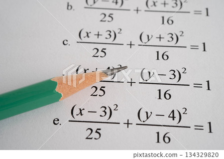 Pencil on mathematic formula exercise test paper in education school. 134329820