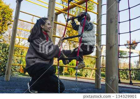 Toddler's Active Outdoor Play. Child Development and Family Time Toddler's Active Outdoor Play. Child Development and Family Time 134329901