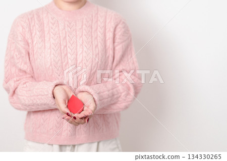 Adult woman with red Blood drop paper for concept of June World Blood Donor day, Donation, April Hemophilia awareness day, May Thalassemia Day, Anemia awareness, June Sickle Cell and Blood Disorders Adult woman with red Blood drop paper for concept of June World Blood Donor day, Donation, April Hemophilia awareness day, May Thalassemia Day, Anemia awareness, June Sickle Cell and Blood Disorders 134330265