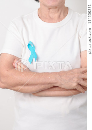 Elderly with blue Ribbon for Prostate Cancer Awareness month, April Child Abuse Prevention, National Bullying, September Addiction Recovery, May Chronic Fatigue Syndrome and January Human Trafficking 134330281