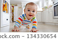 A baby is crawling and happy in the house. 134330654
