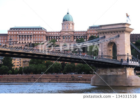 Szechenyi Chain Bridge and Buda Castle as seen from a Danube River cruise ship in Budapest, Hungary Szechenyi Chain Bridge and Buda Castle as seen from a Danube River cruise ship in Budapest, Hungary 134331516
