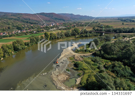 Sand and gravel exploitation in the river aerial view Sand and gravel exploitation in the river aerial view 134331697