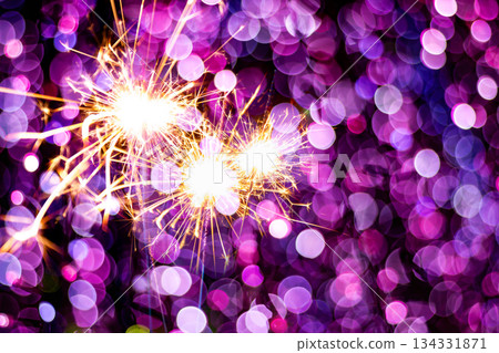 beautiful bokeh of christmas sparkler, holiday background and happy new year creating festive atmosphere for celebration or holiday event beautiful bokeh of christmas sparkler, holiday background and happy new year creating festive atmosphere for celebration or holiday event 134331871