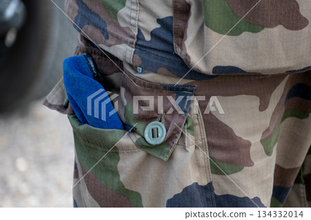 French soldier working in camouflage uniform, french army 134332014