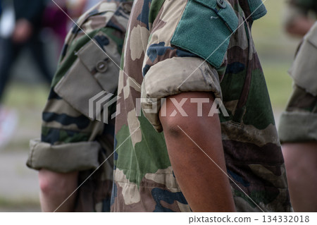 French soldier working in camouflage uniform, french army French soldier working in camouflage uniform, french army 134332018