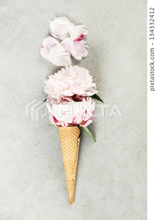 Creative Floral Arrangement in Ice Cream Cone on Gray 134332412