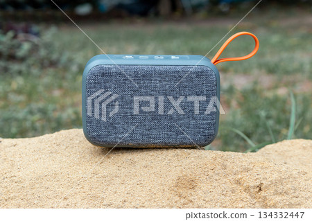 closeup of portable wireless speaker for listening to music, bluetooth speaker 134332447