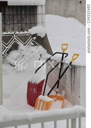 A plastic shovel and a mama's dump truck in front of the house A plastic shovel and a mama's dump truck in front of the house 134332485
