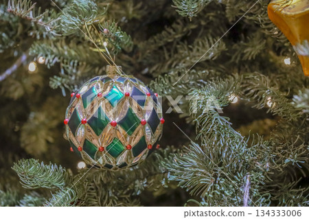 Dec 6 2025 Sparkling Christmas Ornament Balls Hanging on Tree Dec 6 2025 Sparkling Christmas Ornament Balls Hanging on Tree 134333006