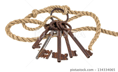 Old key chain on a ring, isolated on a white background. 134334065