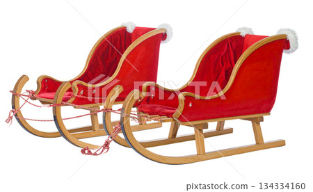 Red 3D Christmas sleigh with gifts isolated on white background. Red 3D Christmas sleigh with gifts isolated on white background. 134334160