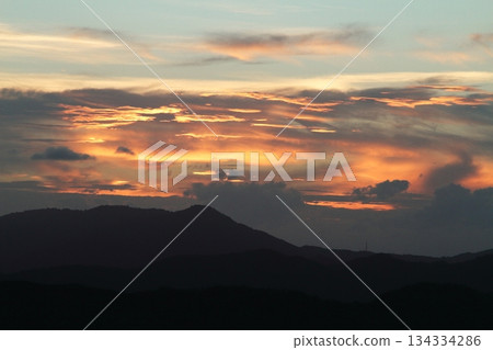 Sunset over the mountains Sunset over the mountains 134334286
