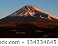 Mount Fuji and the Hoei crater at sunrise from the Torigoki Plateau Observatory on Mount Echizen in the Aitaka Mountains 134334645
