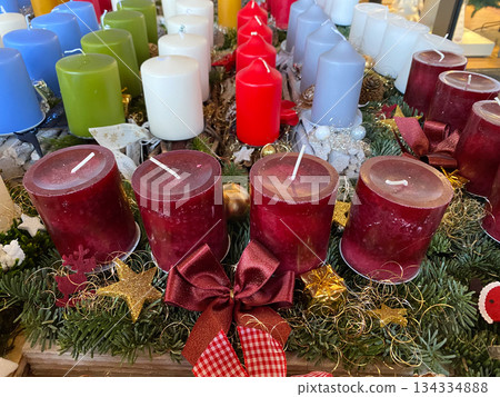 Lots of Christmas candles at the market. Holiday shopping Lots of Christmas candles at the market. Holiday shopping 134334888
