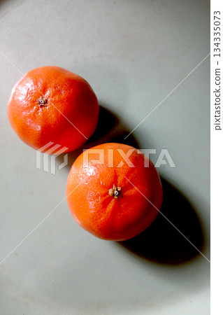 Twin, Juicy, Tasty Orange Fruits 134335073