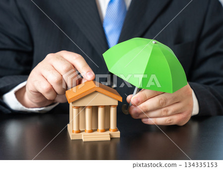 The bank is under the protection of a green umbrella. Additional bank financing and improved liquidity. Financial safety, capital support and risk management measures strengthen stability 134335153