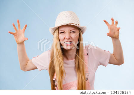 Funny angry teenage woman 134336184