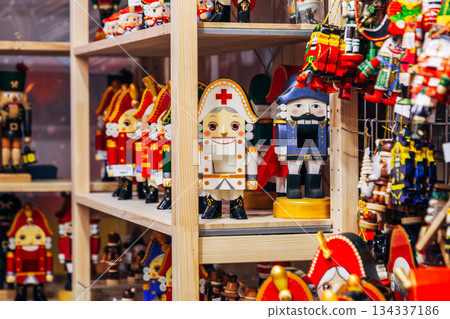 Traditional Christmas souvenir nutcrackers sold on Christmas market Traditional Christmas souvenir nutcrackers sold on Christmas market 134337186