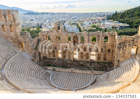 Odeon of Herodes Atticus is a stone Roman theatre structure located on the southwest slope of the Acropolis of Athens, Greece Odeon of Herodes Atticus is a stone Roman theatre structure located on the southwest slope of the Acropolis of Athens, Greece 134337581