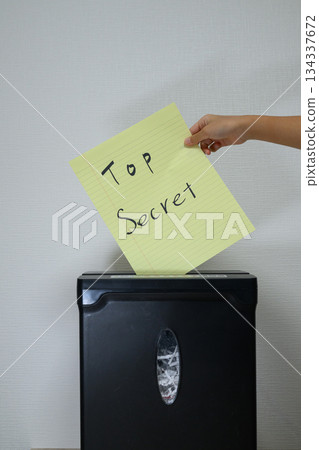 Shredding top-secret documents Shredding top-secret documents 134337672