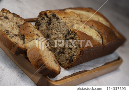 Delicious homemade banana bread sliced and ready to enjoy Delicious homemade banana bread sliced and ready to enjoy 134337893