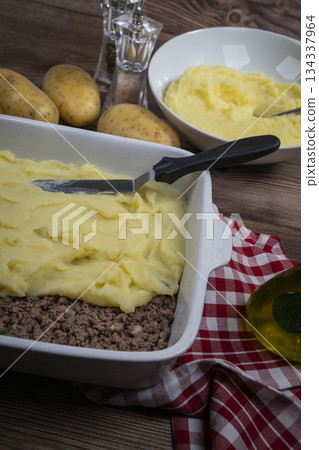 Hachis parmentier, french dish with mashed potato and minced beef Hachis parmentier, french dish with mashed potato and minced beef 134337964