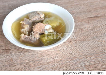 boiled pickled cabbage and bitter melon with pork bone in clear soup on bowl boiled pickled cabbage and bitter melon with pork bone in clear soup on bowl 134339098