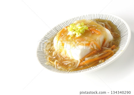 Silken tofu with thick bean paste photographed on a white background Silken tofu with thick bean paste photographed on a white background 134340290